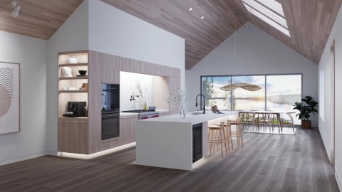 Kitchen with open floor plan, vaulted ceilings, and skylights.